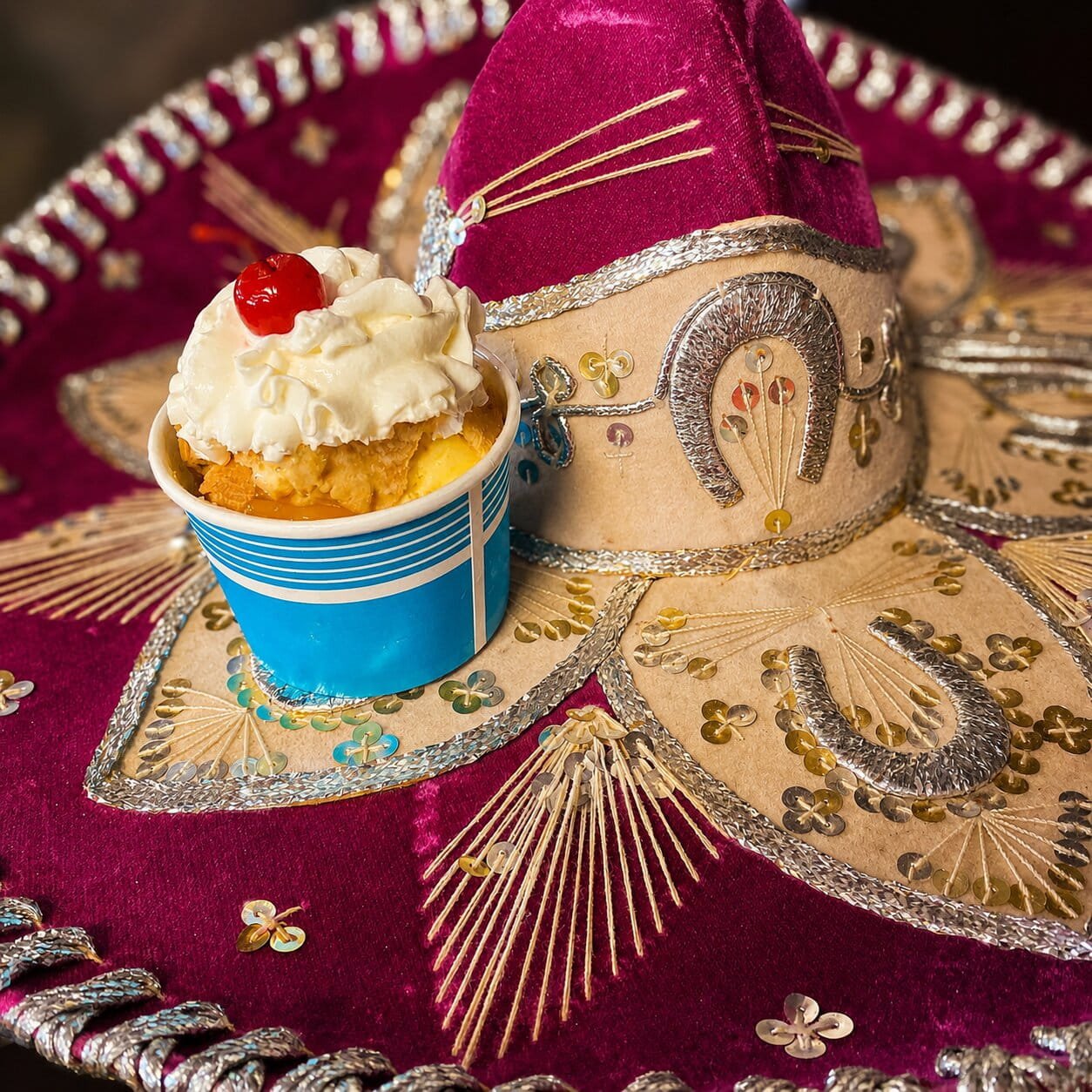 A dessert sitting on top of a Sombrero